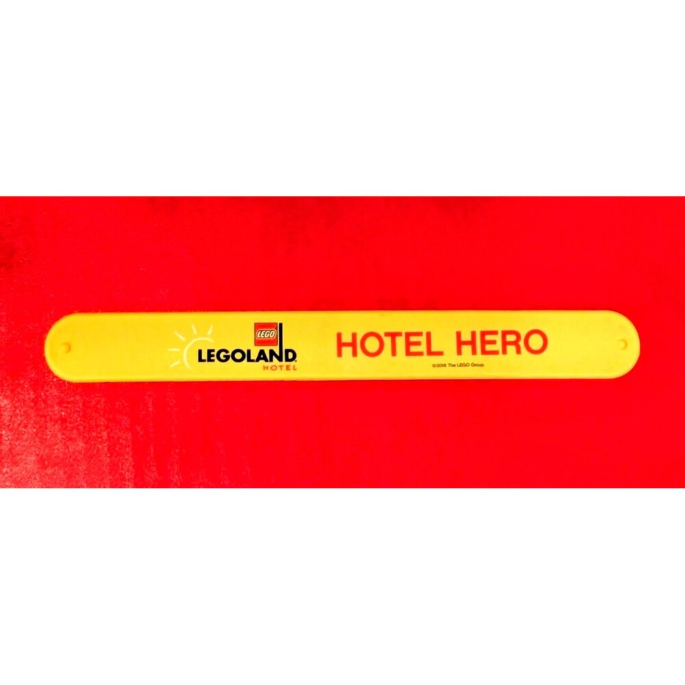 Yellow Hotel Legoland Logo Branded 2016 8.5L x 1"T Slap Vinyl Rigid Bracelet EUC